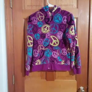 A purple zip up fleece